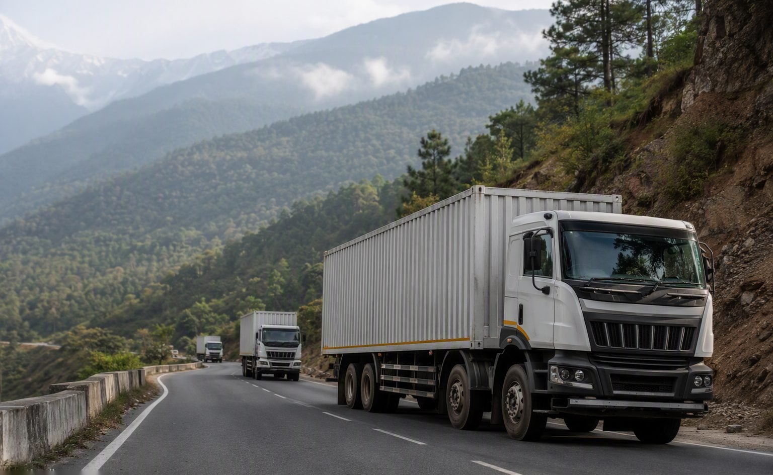 Illustrative image — Cargo trucks at a land border crossing checkpoint in the Himalayan foothills, representing overland food ingredient trade