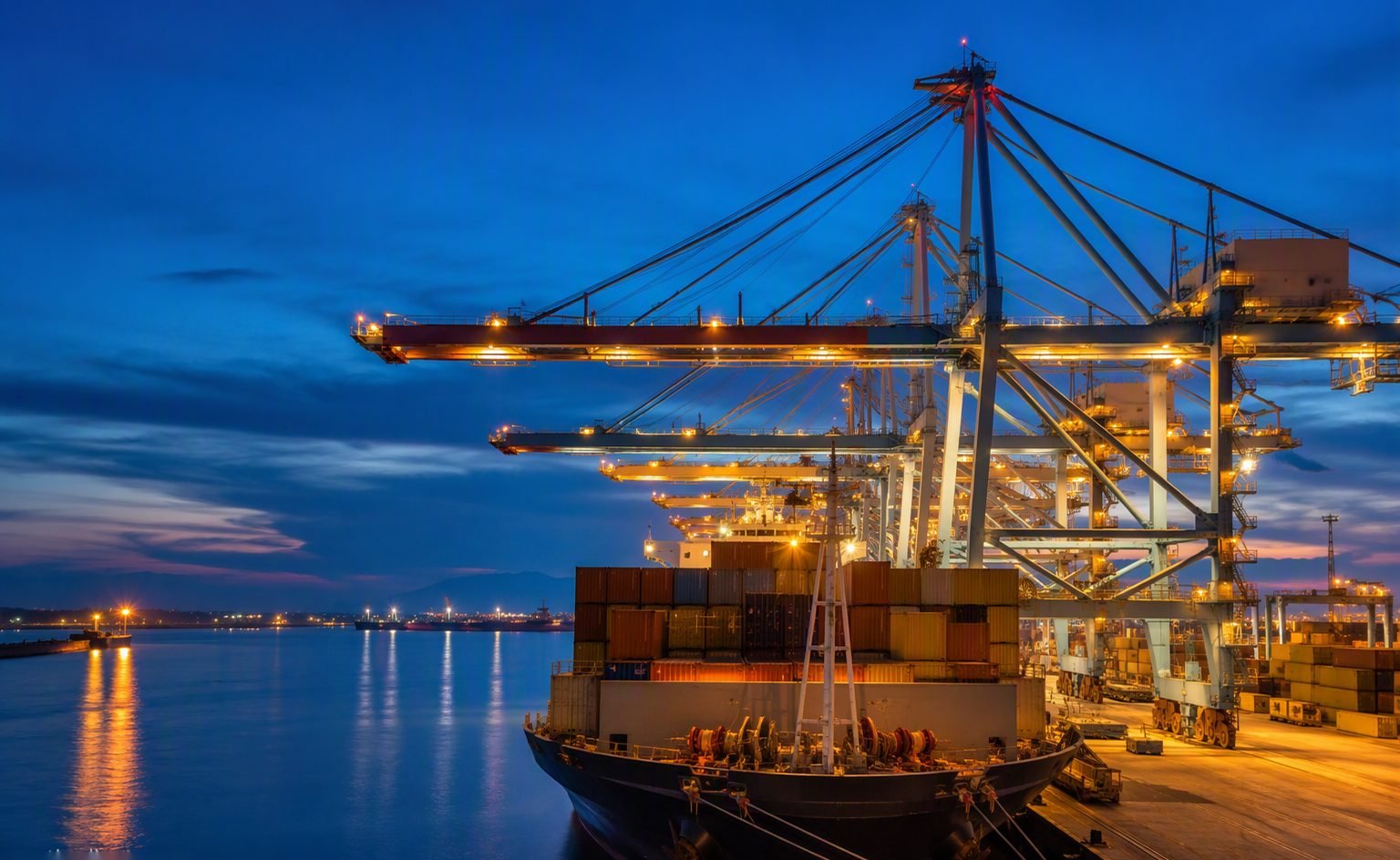 Illustrative image — Deep-sea container terminal with gantry cranes and a modern city skyline on the horizon, representing Gulf food imports